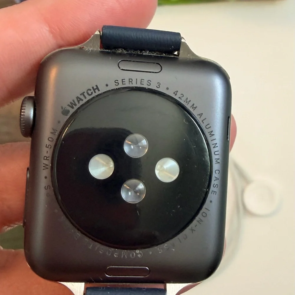 Apple Smartwatch Series 3 42 mm with Navy Strap & Charger.